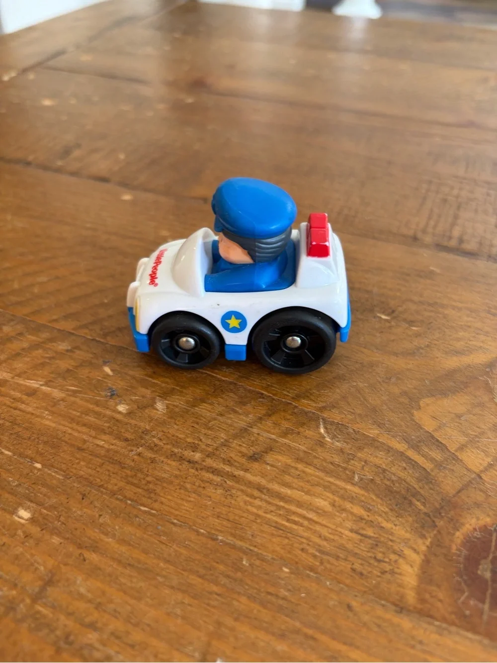 Fisher Price Little People police wheelie as is